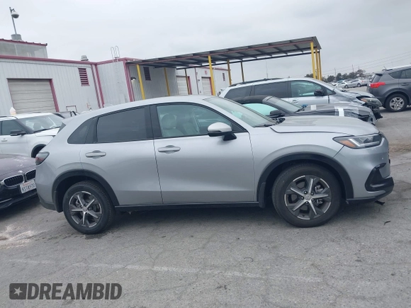 2024 Honda HR-V EX-L z VIN 3CZRZ1H71RM758910, wystawiony jako IAAI lot #42202774 z przebiegiem 8 452 mil mil oraz . Historia ofert i sprzedaży dostępna na DreamBid. Obrazek 14.