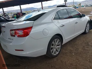 2015 Chevrolet Malibu LTZ with VIN 1G11F5SL7FF223688, listed as a IAAI auction lot 41756239 with 124,823 mi miles. Bid and sale history available at carsss.com. Image 4.
