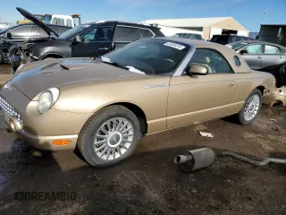 2005 Ford Thunderbird Deluxe with VIN 1FAHP60A35Y109206, listed as a Copart auction lot 87934815 with 37,144 mi miles and Salvage Title. Bid and sale history available at DreamBid. Image 1.