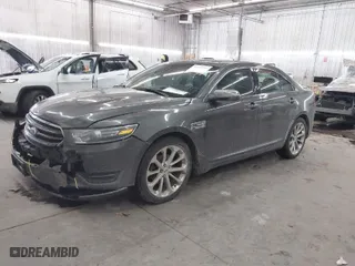 2015 Ford Taurus Limited with VIN 1FAHP2J8XFG192225, listed as a IAAI auction lot 41324244 with 100,395 mi miles. Bid and sale history available at carsss.com. Image 2.