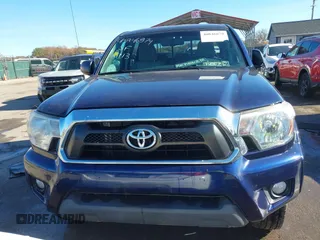 2013 Toyota Tacoma with VIN 3TMMU4FN4DM052928, listed as a IAAI auction lot 40846879 with 113,928 mi miles. Bid and sale history available at carsss.com. Image 12.