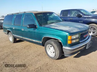 1996 GMC Suburban with VIN 1GDEC16R5TJ742543, listed as a IAAI auction lot 41910103 with 159,469 mi miles and . Bid and sale history available at DreamBid. Image 1.