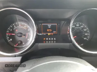 2017 Ford Mustang V6 with VIN 1FA6P8AM6H5287032, listed as a Copart auction lot 50973275 with 98,477 mi miles and Salvage Title. Bid and sale history available at carsss.com. Image 9.