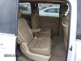 2010 Honda Odyssey Touring with VIN 5FNRL3H99AB005395, listed as a IAAI auction lot 42027445 with 181,559 mi miles. Bid and sale history available at carsss.com. Image 8.