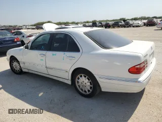 2000 Mercedes-Benz E-Class with VIN WDBJF65J5YB054237, listed as a Copart auction lot 76315974 with 95,092 mi miles and Salvage Title. Bid and sale history available at carsss.com. Image 2.