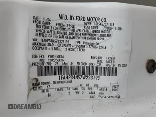 2007 Ford Focus S z VIN 1FAHP34N57W223198, wystawiony jako Copart lot #55725345 z przebiegiem 174 833 mil mil oraz Szkoda całkowita • Salvage title. Historia ofert i sprzedaży dostępna na DreamBid. Obrazek 12.