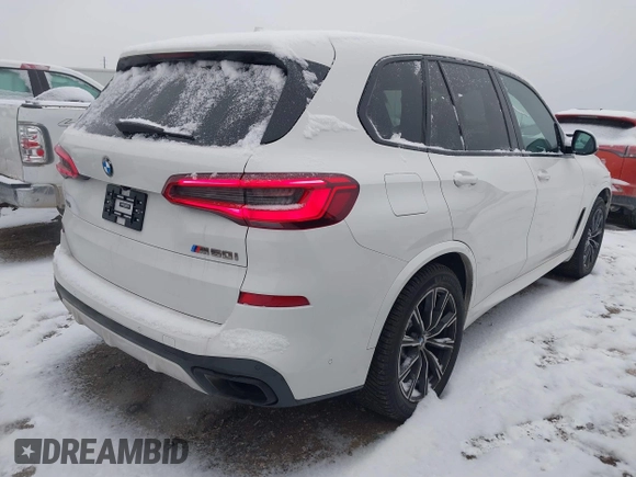2020 BMW X5 M50i with VIN 5UXJU4C09LLE45658, listed as a IAAI auction lot 41307154 with 69,936 mi miles and . Bid and sale history available at DreamBid. Image 4.