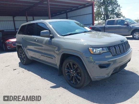 2020 Jeep Grand Cherokee Altitude with VIN 1C4RJFAG3LC141313, listed as a IAAI auction lot 41925706 with 61,000 mi miles. Bid and sale history available at carsss.com. Image 1.