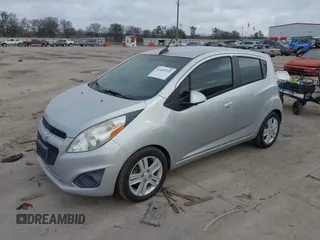 2015 Chevrolet Spark LS with VIN KL8CB6S95FC736907, listed as a IAAI auction lot 42170458 with 102,915 mi miles and . Bid and sale history available at DreamBid. Image 2.