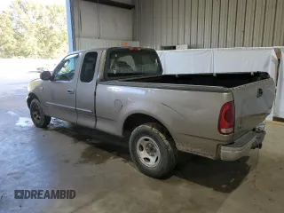 2003 Ford F-150 XL with VIN 1FTRX17283NA46215, listed as a Copart auction lot 85194094 with 168,415 mi miles and Salvage title. Bid and sale history available at DreamBid. Image 2.