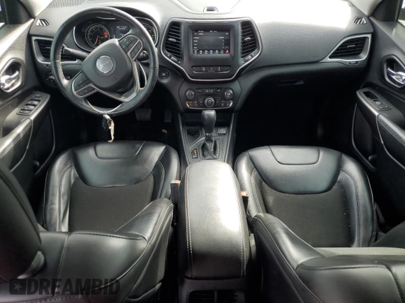 2021 Jeep Cherokee Altitude с VIN 1C4PJLLB5MD112348, выставлен на аукционе Copart как лот 59536115 с пробегом 129 897 миль миль и Списание • Salvage title. История ставок и продаж доступна на DreamBid. Изображение 8.