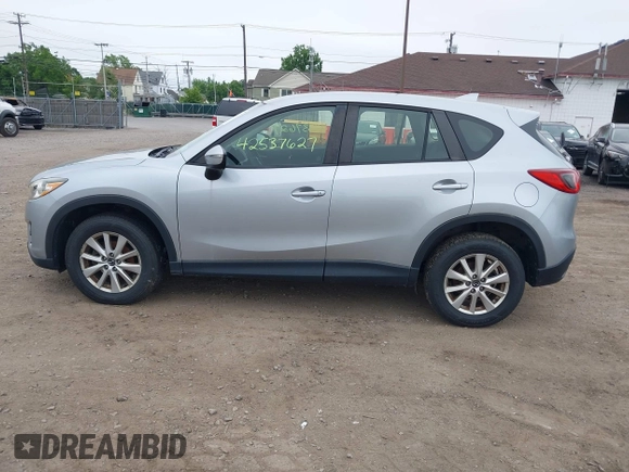 2016 Mazda CX-5 Sport z VIN JM3KE4BY1G0711602, wystawiony jako IAAI lot #42537627 z przebiegiem Nie podano mil oraz . Historia ofert i sprzedaży dostępna na DreamBid. Obrazek 14.