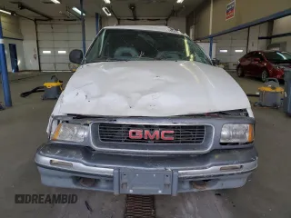 1996 GMC Jimmy SL with VIN 1GKDT13W4T2572197, listed as a Copart auction lot 76535534 with 157,624 mi miles and Salvage Title. Bid and sale history available at carsss.com. Image 5.