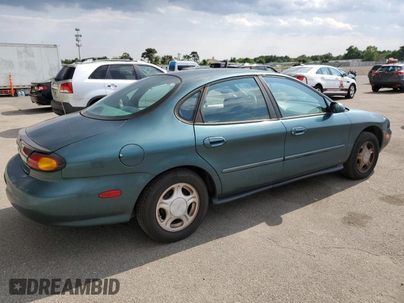 1997 Ford Taurus GL with VIN 1FALP52U4VA323402, listed as a Copart auction lot 65742235 with 43,415 mi miles and Clean title. Bid and sale history available at DreamBid. Image 3.