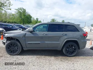 2021 Jeep Grand Cherokee Laredo E with VIN 1C4RJFAG4MC700384, listed as a IAAI auction lot 42192672 with 54,525 mi miles and . Bid and sale history available at DreamBid. Image 15.