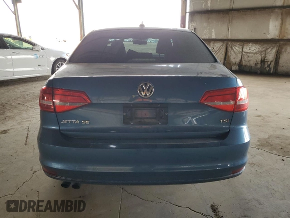 2015 Volkswagen Jetta SE with VIN 3VWD17AJ4FM319385, listed as a Copart auction lot 58380125 with 124,877 mi miles and Salvage title. Bid and sale history available at DreamBid. Image 6.