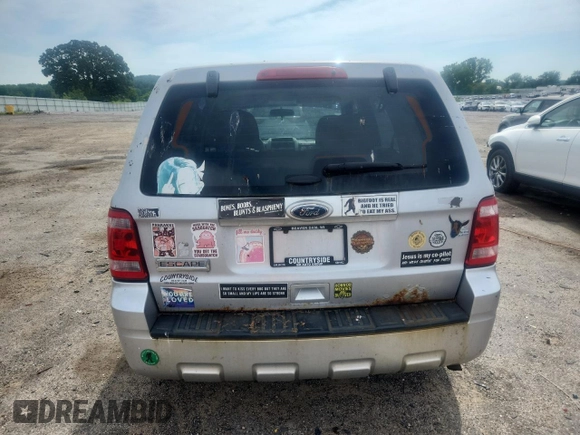 2012 Ford Escape XLS z VIN 1FMCU0C79CKC84677, wystawiony jako Copart lot #64234045 z przebiegiem 138 562 mil mil oraz Czysty tytuł • Clean title. Historia ofert i sprzedaży dostępna na DreamBid. Obrazek 6.