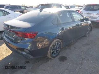 2023 Kia Forte LXS z VIN 3KPF24AD8PE654341, wystawiony jako IAAI lot #41261511 z przebiegiem 20 312 mil mil oraz . Historia ofert i sprzedaży dostępna na DreamBid. Obrazek 4.