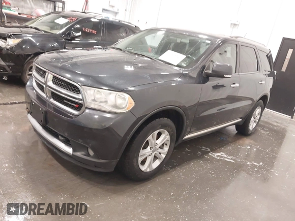 2013 Dodge Durango Crew with VIN 1C4RDJDGXDC691311, listed as a IAAI auction lot 41642267 with 167,098 mi miles and . Bid and sale history available at DreamBid. Image 23.