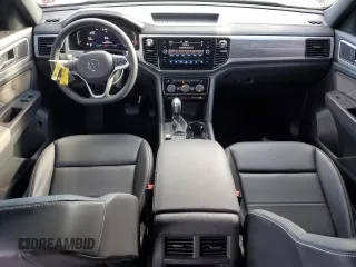 2023 Volkswagen Atlas SE с VIN 1V2HE2CA4PC207034, выставлен на аукционе Copart как лот 74105433 с пробегом 9 918 миль миль и . История ставок и продаж доступна на DreamBid. Изображение 8.