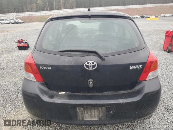 2009 Toyota Yaris with VIN JTDKT903095243922, listed as a Copart auction lot 51293545 with 196,909 mi miles and Salvage Title. Bid and sale history available at carsss.com. Image 6.