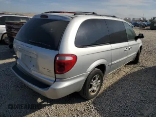 2001 Dodge Caravan ES with VIN 2B8GP54L01R107581, listed as a Copart auction lot 75209744 with 93,086 mi miles and Salvage Title. Bid and sale history available at DreamBid. Image 3.