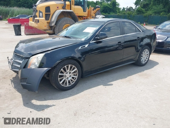 2011 Cadillac CTS Luxury with VIN 1G6DF5EY8B0100736, listed as a IAAI auction lot 42581059 with 107,237 mi miles and . Bid and sale history available at DreamBid. Image 2.