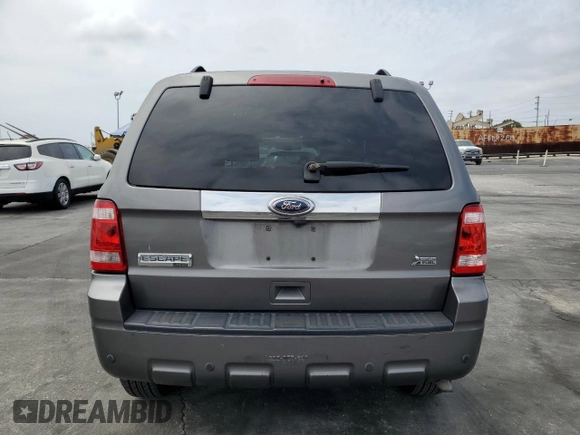 2010 Ford Escape Limited с VIN 1FMCU0EG8AKD06419, выставлен на аукционе Copart как лот 62357115 с пробегом 138 687 миль миль и Списание • Salvage title. История ставок и продаж доступна на DreamBid. Изображение 6.