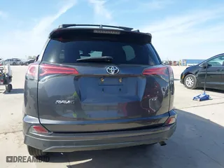 2018 Toyota RAV4 LE with VIN 2T3ZFREV4JW412661, listed as a IAAI auction lot 41781229 with 140,131 mi miles. Bid and sale history available at carsss.com. Image 16.