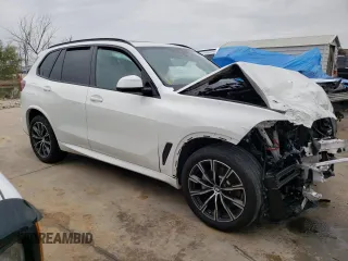 2020 BMW X5 sDrive40i with VIN 5UXCR4C09L9D01101, listed as a Copart auction lot 66698282 with 0 mi miles. Bid and sale history available at carsss.com. Image 4.