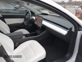 2018 Tesla Model 3 Long Range Battery with VIN 5YJ3E1EB4JF086012, listed as a IAAI auction lot 41683859 with 52,059 mi miles and . Bid and sale history available at DreamBid. Image 5.