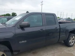 2014 Chevrolet Silverado 1500 LT with VIN 1GCRCREH5EZ371465, listed as a IAAI auction lot 42185657 with 112,151 mi miles and . Bid and sale history available at DreamBid. Image 14.