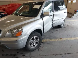 2005 Honda Pilot EX with VIN 2HKYF18405H521468, listed as a IAAI auction lot 41610497 with 244,806 mi miles. Bid and sale history available at carsss.com. Image 17.