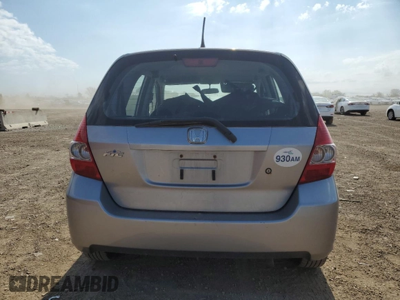 2007 Honda Fit z VIN JHMGD38497S025472, wystawiony jako Copart lot #55901095 z przebiegiem 120 216 mil mil oraz Szkoda całkowita • Salvage title. Historia ofert i sprzedaży dostępna na DreamBid. Obrazek 6.