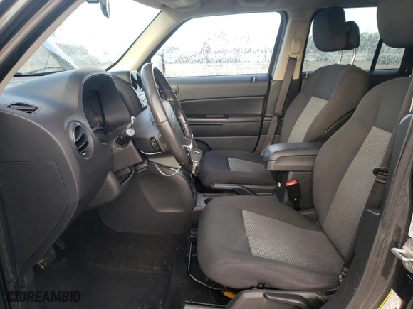 2010 Jeep Patriot Sport with VIN 1J4NF1GB7AD646626, listed as a Copart auction lot 87012374 with 130,867 mi miles and Salvage Title. Bid and sale history available at carsss.com. Image 7.