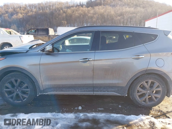 2018 Hyundai Santa Fe Ultimate with VIN 5XYZWDLA2JG570515, listed as a IAAI auction lot 41427397 with 67,135 mi miles and . Bid and sale history available at DreamBid. Image 14.