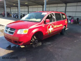 2009 Dodge Grand Caravan SXT with VIN 2D8HN54X99R524373, listed as a IAAI auction lot 41886225 with 124,590 mi miles. Bid and sale history available at carsss.com. Image 2.