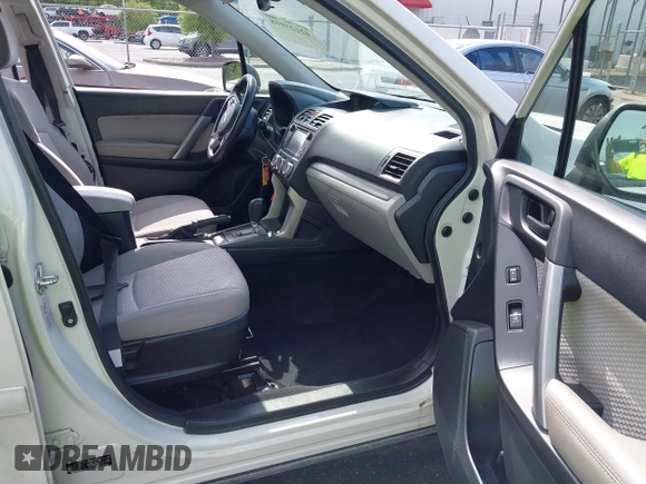 2018 Subaru Forester z VIN JF2SJABC5JH444739, wystawiony jako IAAI lot #42123918 z przebiegiem 124 520 mil mil oraz . Historia ofert i sprzedaży dostępna na DreamBid. Obrazek 5.