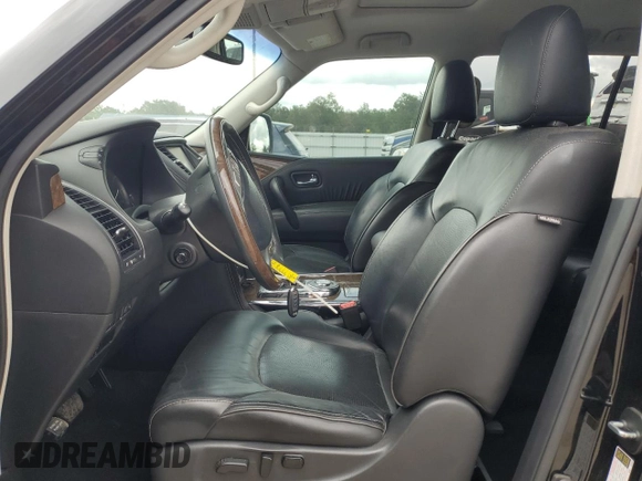 2017 Infiniti QX80 with VIN JN8AZ2ND9H9831199, listed as a Copart auction lot 70854654 with 142,994 mi miles and Salvage Title. Bid and sale history available at carsss.com. Image 7.