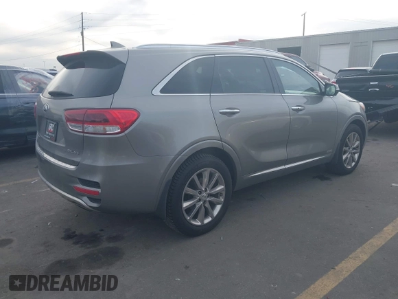 2017 Kia Sorento SX with VIN 5XYPKDA59HG304752, listed as a IAAI auction lot 40931971 with 143,211 mi miles and . Bid and sale history available at DreamBid. Image 4.