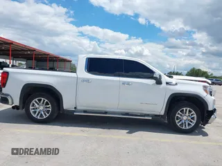 2019 GMC Sierra 1500 SLT z VIN 3GTP8DED7KG268973, wystawiony jako IAAI lot #42224064 z przebiegiem 98 871 mil mil oraz . Historia ofert i sprzedaży dostępna na DreamBid. Obrazek 14.