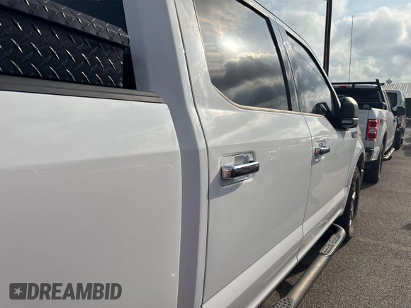 2019 Ford F-150 XL with VIN 1FTFW1E42KKF27037, listed as a IAAI auction lot 42777832 with 169,179 mi miles and . Bid and sale history available at DreamBid. Image 17.