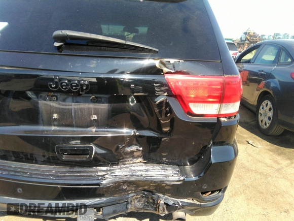 2011 Jeep Grand Cherokee Laredo with VIN 1J4RR4GG4BC558193, listed as a IAAI auction lot 40055870 with 110,939 mi miles and . Bid and sale history available at DreamBid. Image 12.