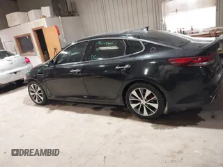 2016 Kia Optima SX Turbo with VIN 5XXGW4L27GG106780, listed as a IAAI auction lot 41586007 with 114,756 mi miles and . Bid and sale history available at carsss.com. Image 15.