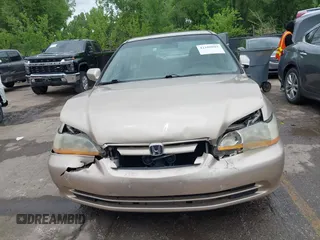 2002 Honda Accord EX z VIN 1HGCG16582A073438, wystawiony jako IAAI lot #42109802 z przebiegiem 172 379 mil mil oraz . Historia ofert i sprzedaży dostępna na DreamBid. Obrazek 12.