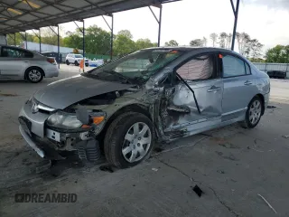 2006 Honda Civic LX with VIN 1HGFA16506L065908, listed as a Copart auction lot 51797795 with 87,456 mi miles and Salvage Title. Bid and sale history available at DreamBid. Image 1.
