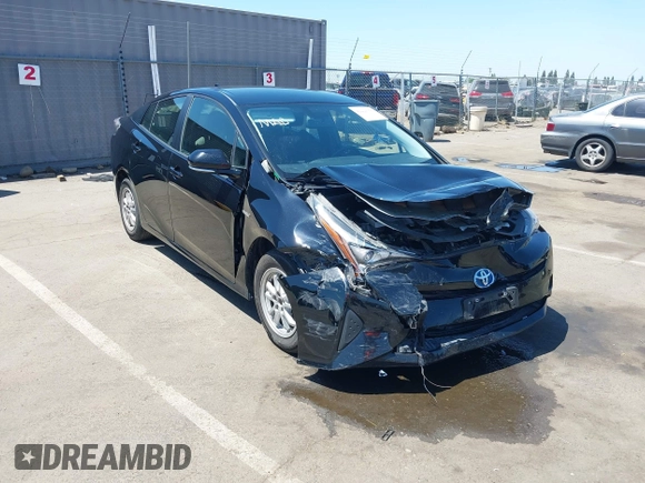 2016 Toyota Prius Four z VIN JTDKARFU7G3017018, wystawiony jako IAAI lot #42224376 z przebiegiem 74 136 mil mil oraz . Historia ofert i sprzedaży dostępna na DreamBid. Obrazek 1.