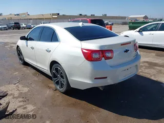 2013 Chevrolet Malibu LTZ with VIN 1G11J5SX2DF337404, listed as a IAAI auction lot 41732337 with 112,276 mi miles. Bid and sale history available at carsss.com. Image 3.