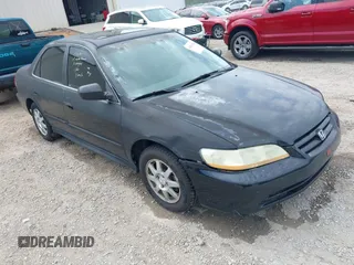 2002 Honda Accord SE z VIN 1HGCG668X2A171099, wystawiony jako IAAI lot #42081358 z przebiegiem 215 915 mil mil oraz . Historia ofert i sprzedaży dostępna na DreamBid. Obrazek 1.