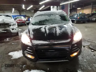 2015 Ford Escape Titanium with VIN 1FMCU0J91FUA41653, listed as a Copart auction lot 88871205 with 128,971 mi miles and Salvage Title. Bid and sale history available at DreamBid. Image 5.